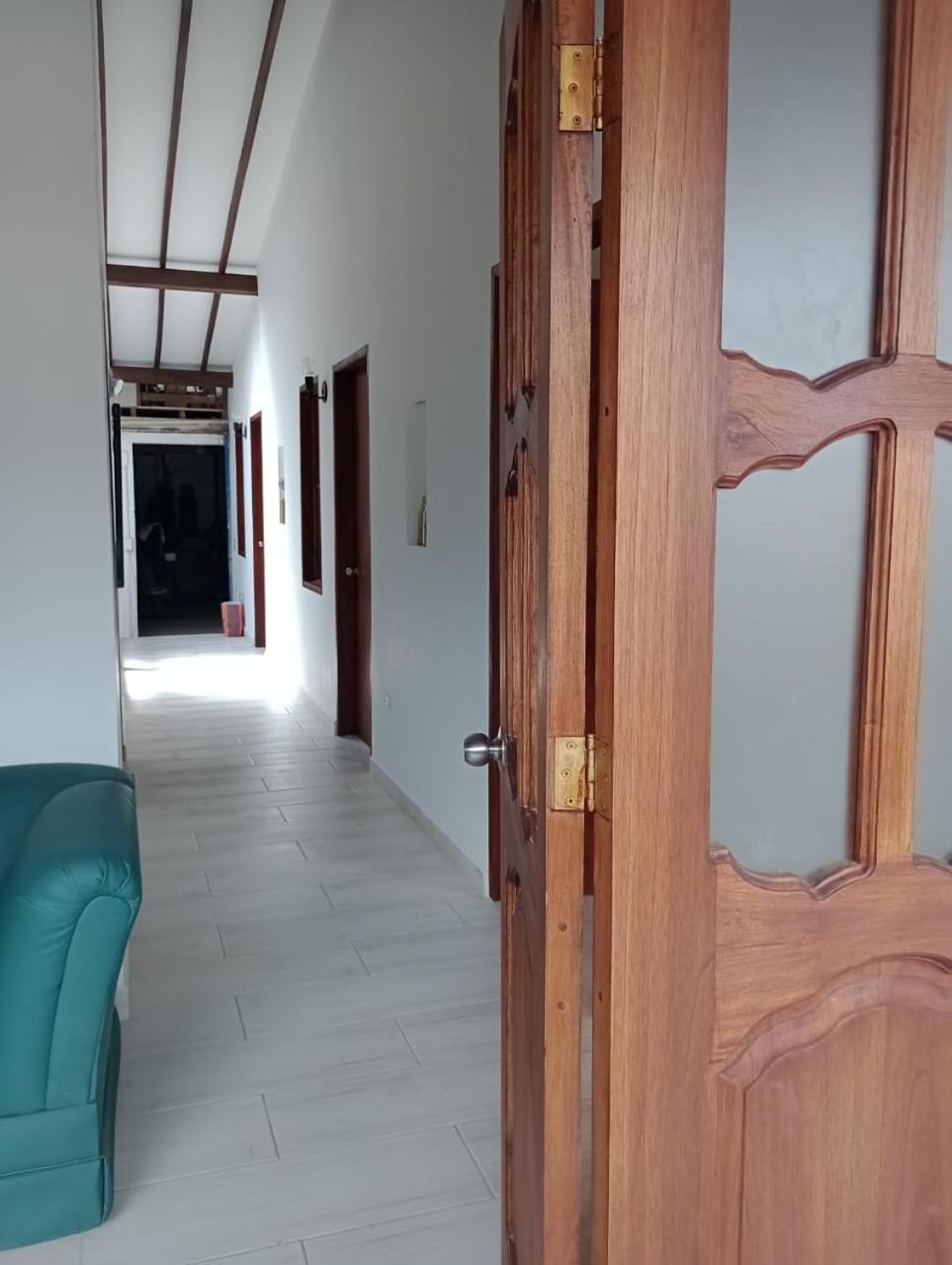 Hostal Famihotel Fundadores Jardin Bagian luar foto